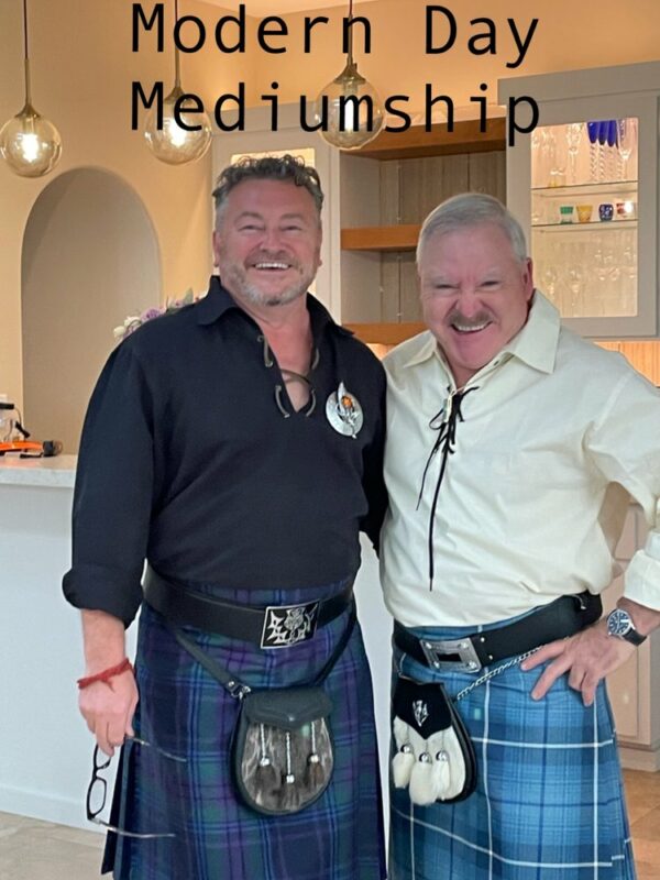 James Van Praagh and Gordon smiling wearing both a kilt